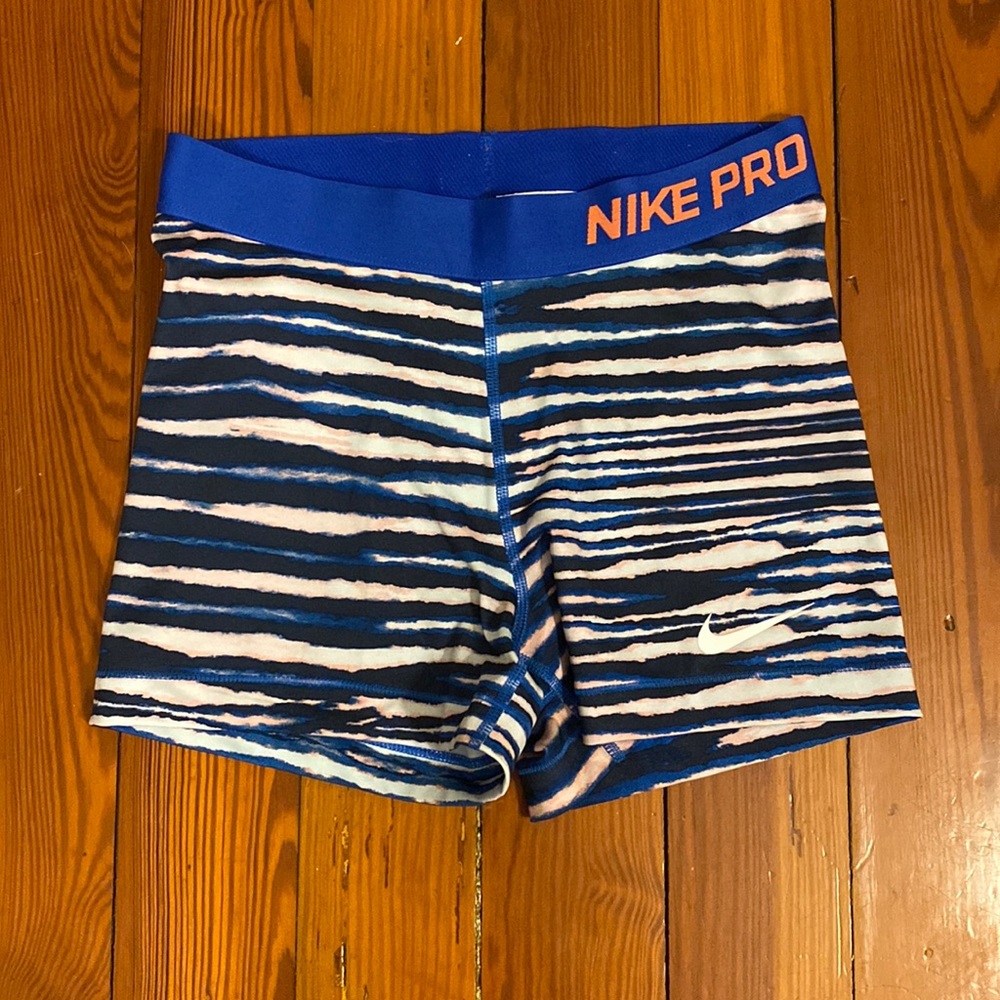 Blue and orange Nike Pro Dri-Fit shorts